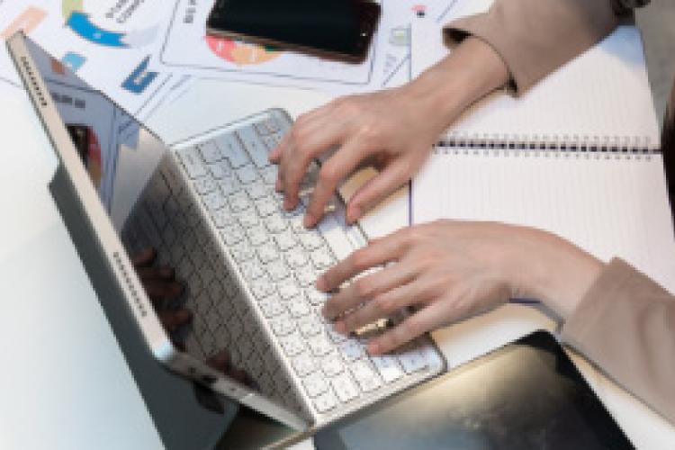 Document Signing - hands and keyboard